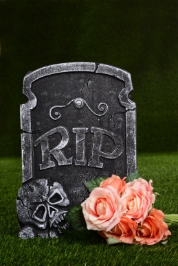 Fake tombstone for yard | River City Landscaping